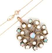 14kt Yellow gold opal and pearl knot pendant on chain