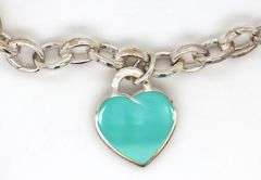 Tiffany & Co oval link bracelet  and enamel heart shaped charm