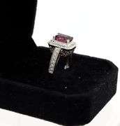 14kt White gold 1.65ct emerald cut tourmaline and diamond halo ring