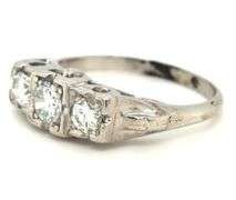 Vintage style 3 stone diamond ring in Platinum