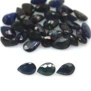 Beautifully colored 9.75ct ink blue Sapphire set