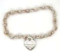 Tiffany & Co oval link bracelet  and enamel heart shaped charm