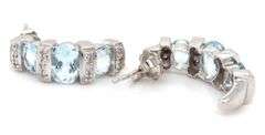 14kt White gold 2.50ctw aquamarine and diamond accent earrings