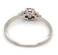 Platinum oval blue star and diamond ring