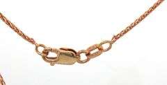 14kt Rose gold diamond and black onyx pendant on chain