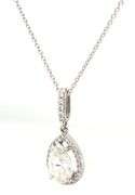 14kt White gold 2ct pear shaped diamond in 1/4ctw halo pendant on chain