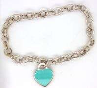 Tiffany & Co oval link bracelet  and enamel heart shaped charm