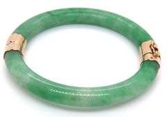 Green Jade hinged bangle bracelet in yellow gold