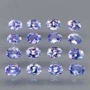 Heavy flashing 2.84ct oval cut Tanzanite set