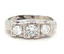 Vintage style 3 stone diamond ring in Platinum