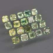 Untreated! Fantastic 2.50ct bright green Sapphire set!