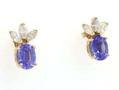 14kt Yellow gold oval tanzanite and diamond marquise stud earrings