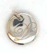 Tiffany & Co. D notes charm in 925 sterling silver
