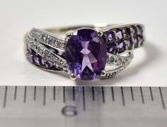 Sparkling 14K white Gold Amethyst Gemstone and Diamond Ring