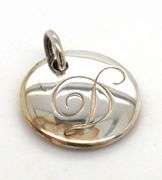 Tiffany & Co. D notes charm in 925 sterling silver