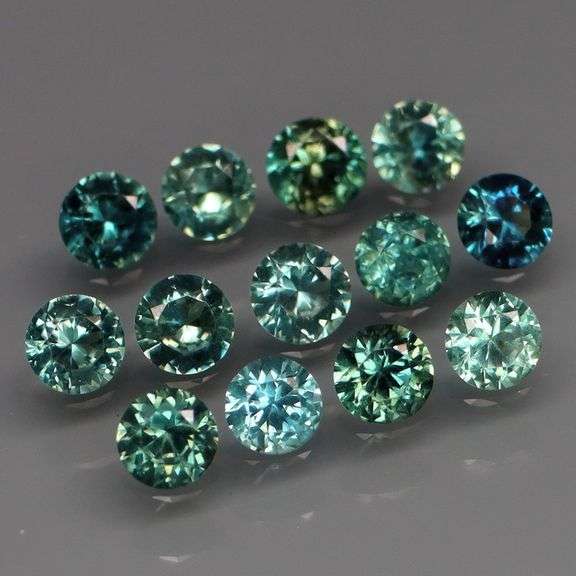Multi-hue 2ct natural blue green Sapphire set
