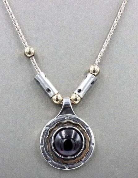 925 Sterling silver Garnet Cab 2 tone pendant on chain