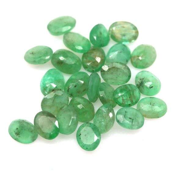 Oval cut 6.87ct 24pc Zambian Emerald set