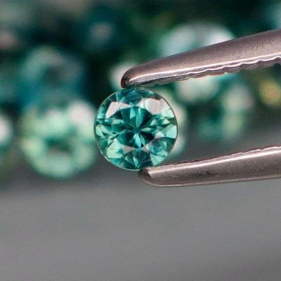 Heated only! 3.30ct blue green Sapphire set!