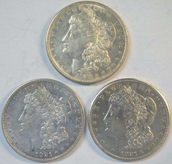 Upper end 1921 P-D-S last year Morgan Silver Dollars