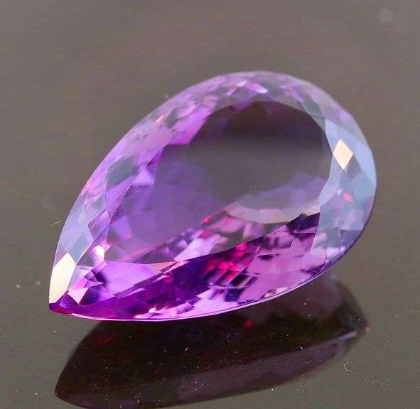 Substantial pear cut 43.03ct violet Amethyst