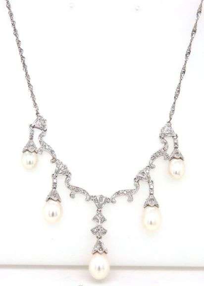 Vintage style pearl drop and diamond accent necklace