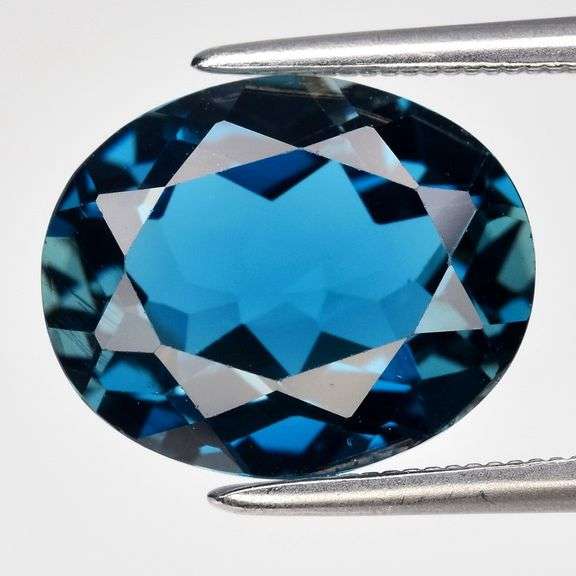 Top London blue! VS grade 5.24ct Brazilian Topaz!