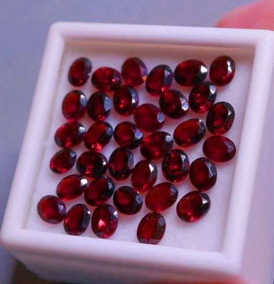 Amazing 14.16ct oval cut cherry red Garnet set
