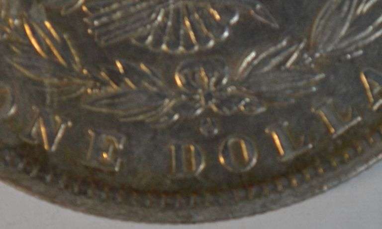 Strong 'O' over 'S' 1882-O Morgan Silver Dollar in AU