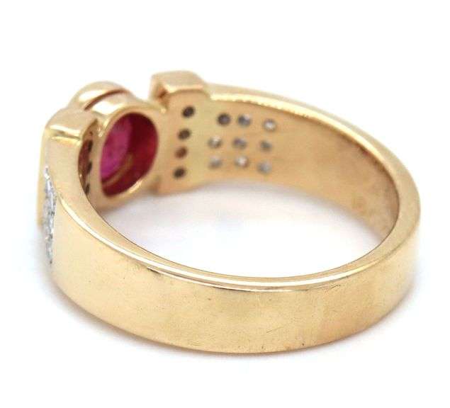 14kt Yellow gold 0.50ct oval ruby and 0.25ctw diamond ring