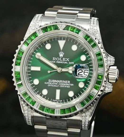 Very rare Emerald and diamond Rolex day just and quieckset submariner