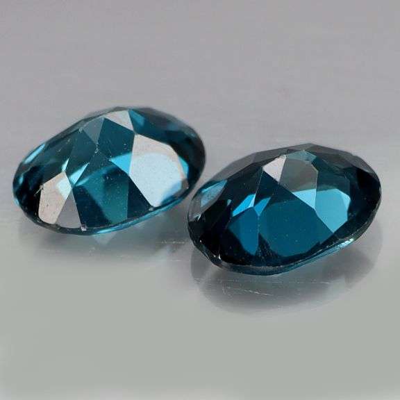 Glittering VS grade 4.44ct pair of London blue Topaz!