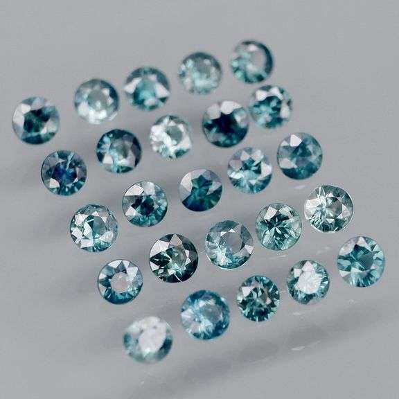 Heated only! 3.14ct blue green Sapphire set