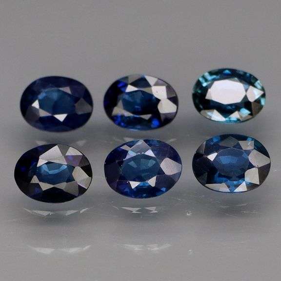 Beautifully colored 1.69ct ink blue Sapphire set
