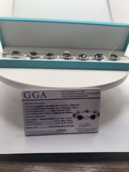 Very fine Black diamond 45.22 ctw with diamond accent set in silver ring, GGV certified