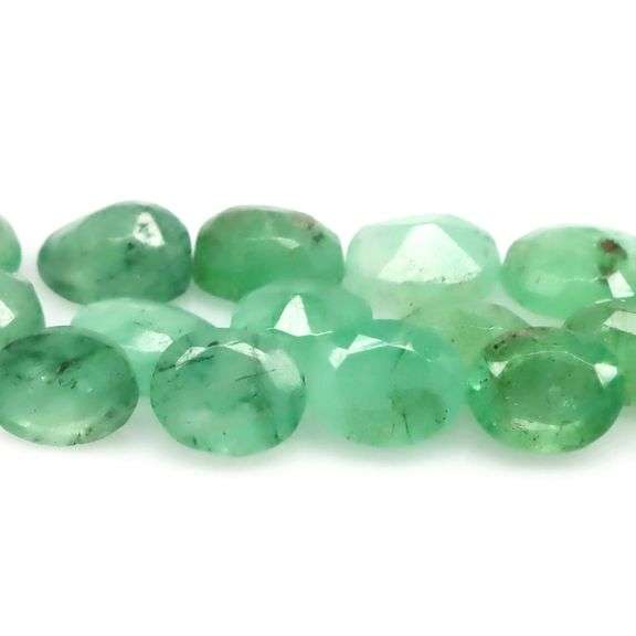 Look! It's a 6.68ct set of Emeralds with matched size and color!