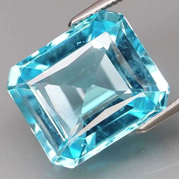 Amazing 12.22ct emerald cut VS grade Swiss blue Topaz