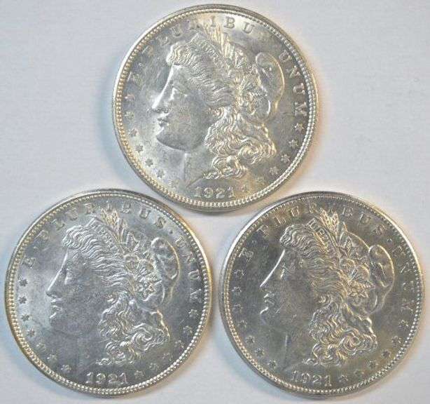 Flashy near mint 1921 P-D-S Morgan Silver Dollars