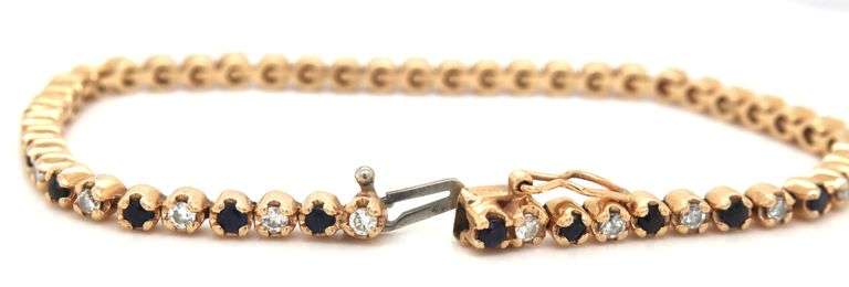 14kt Yellow gold round brilliant cut blue sapphire and diamond link bracelet