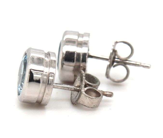 14kt White gold 1.50ctw bezel set aquamarine stud earrings