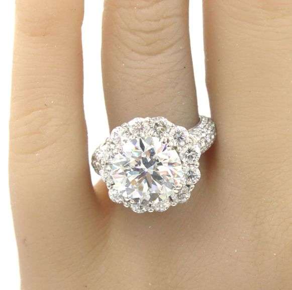 18kt White gold 5.05ct lab grown round brilliant cut with 2.65ctw halo with pave diamond setting