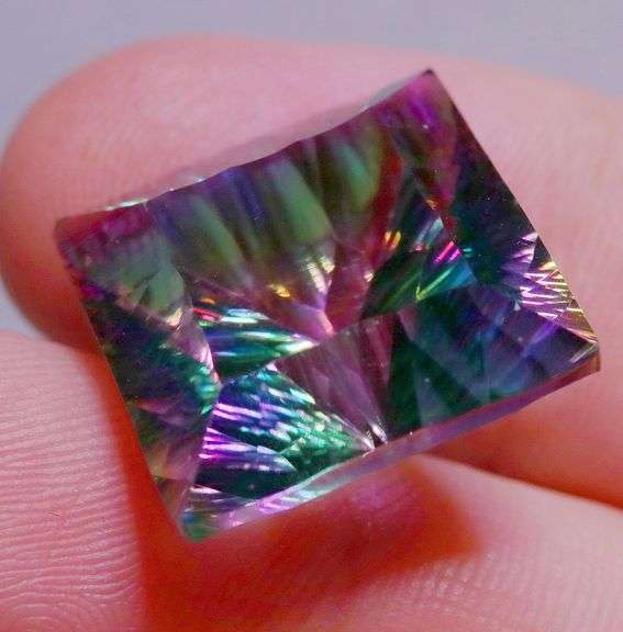 Prismatic! 27.42ct heavy flashing rainbow Mystic Quartz!
