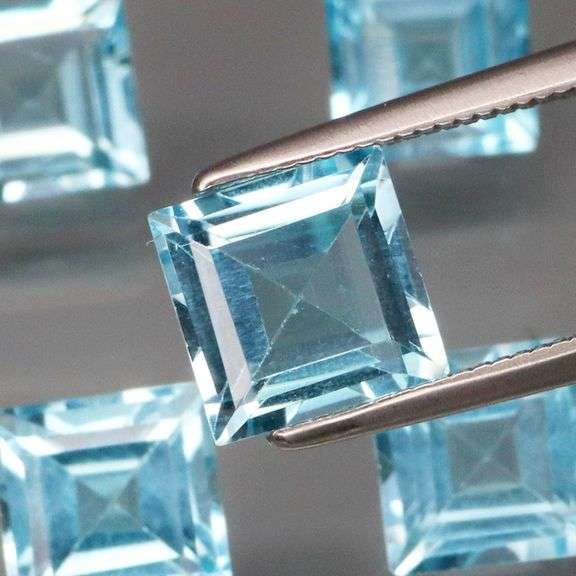 Heavy! 11.36ct Swiss blue princess cut Topaz set!