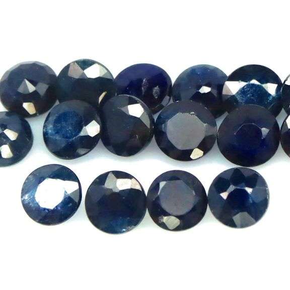 Heated Only! 6.65ct midnight blue Sapphire set