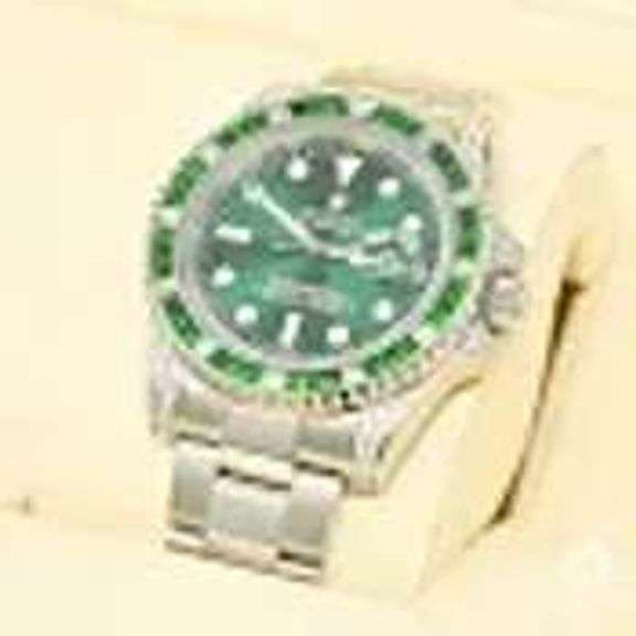Very rare Emerald and diamond Rolex day just and quieckset submariner