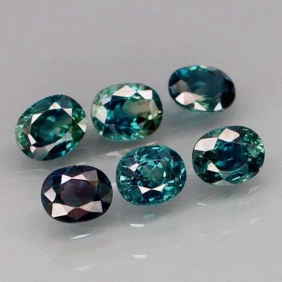 Heated only! 3.14ct blue green Sapphire set from Australia!