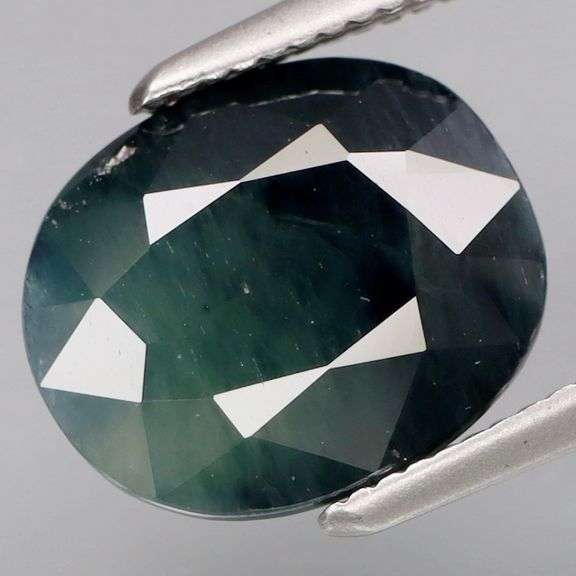 Gorgeous 4.26ct smoky green Sapphire! Heated only!