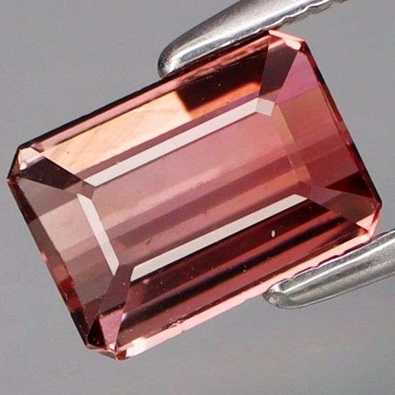 VS grade! Violet pink! 1.28ct solitaire grade Tourmaline!