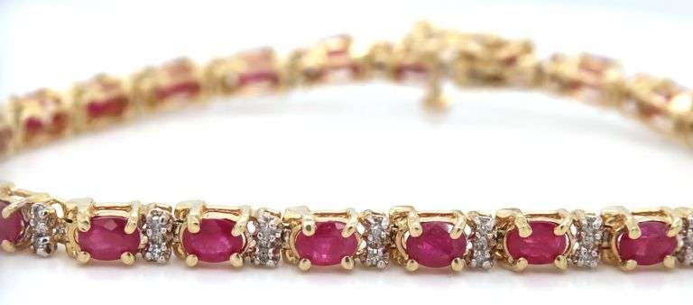 14kt Yellow gold ruby and diamond link bracelet