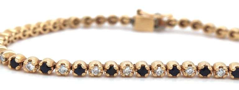 14kt Yellow gold round brilliant cut blue sapphire and diamond link bracelet